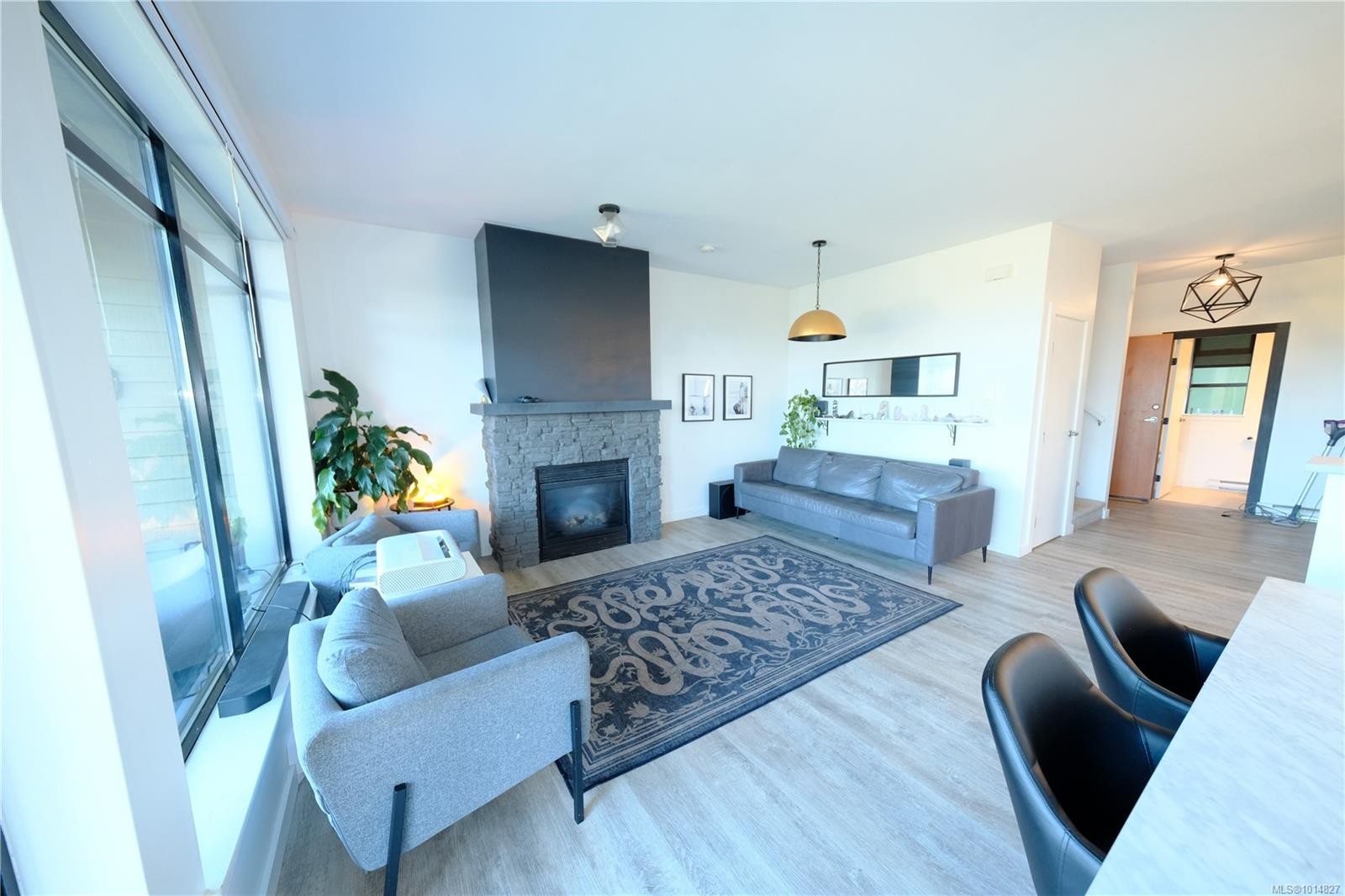 204-591 Pfeiffer Cres, Tofino, BC - Indoor Photo Showing Living Room With Fireplace