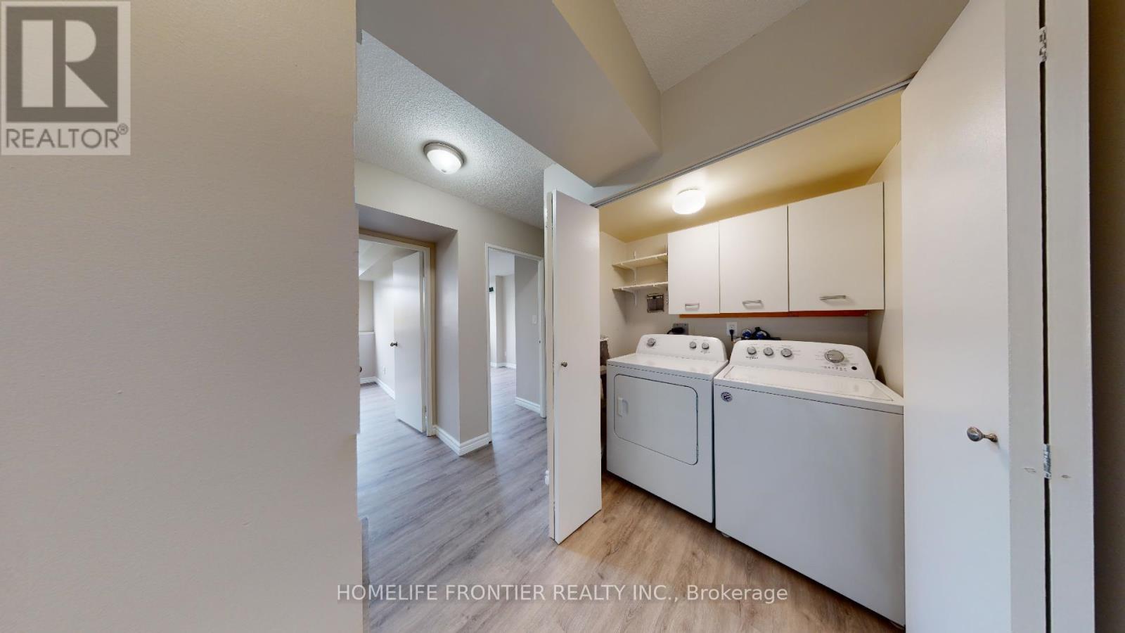 605 - 200 Robert Speck Parkway, Mississauga, ON - Indoor Photo Showing Laundry Room