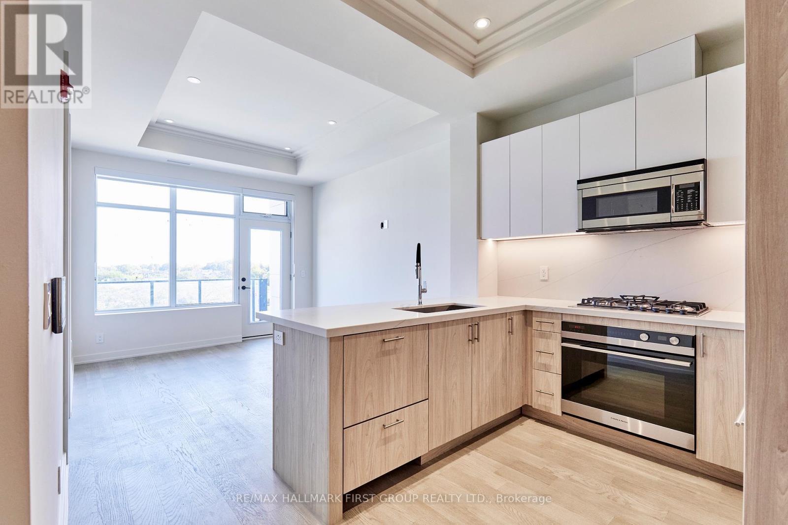 407 - 123 Maurice Drive, Oakville, ON - Indoor Photo Showing Kitchen