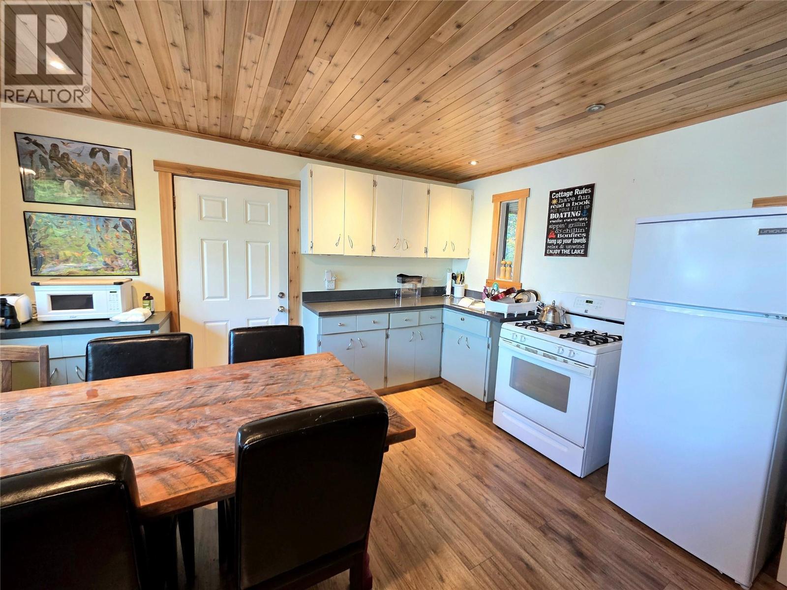 Kitchen in first cabin - 6453 Pinaus Lake Road Lot# 6297, Falkland, BC - Indoor Photo Showing Kitchen With Double Sink