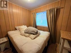 Queen bed in first bedroom -