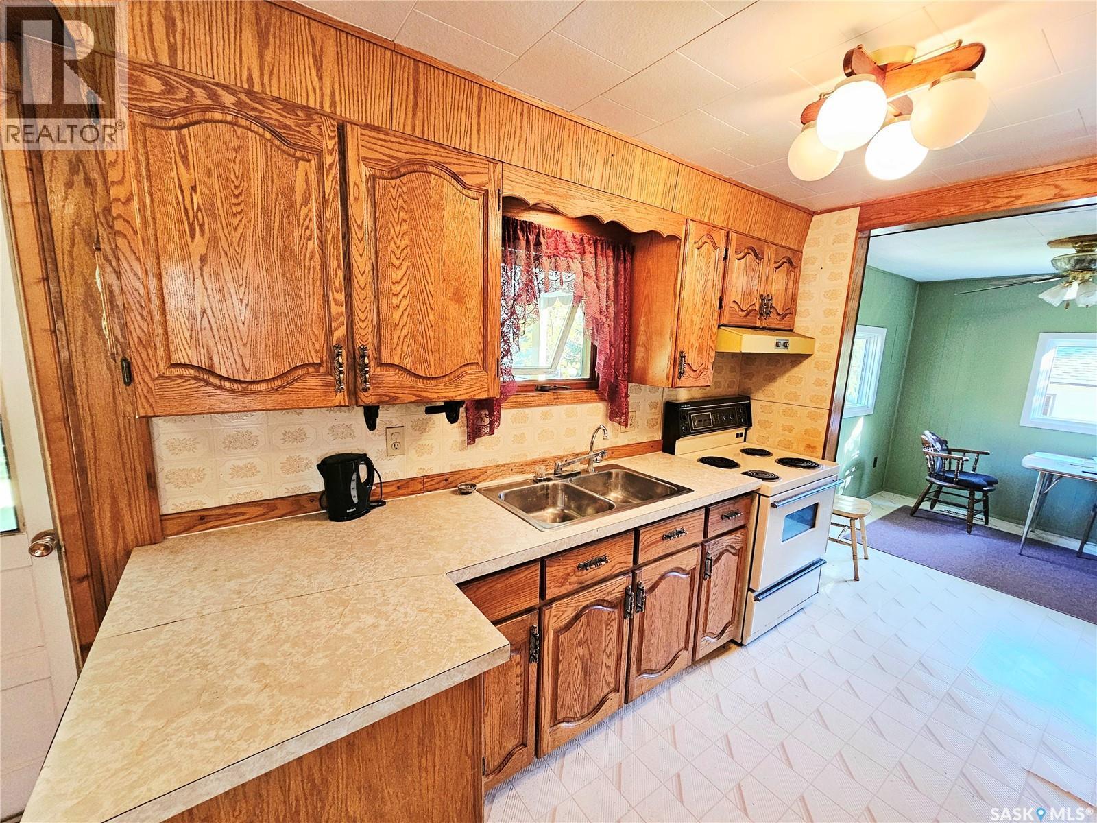 24 Joseph Street, Dubuc, SK - Indoor Photo Showing Kitchen With Double Sink