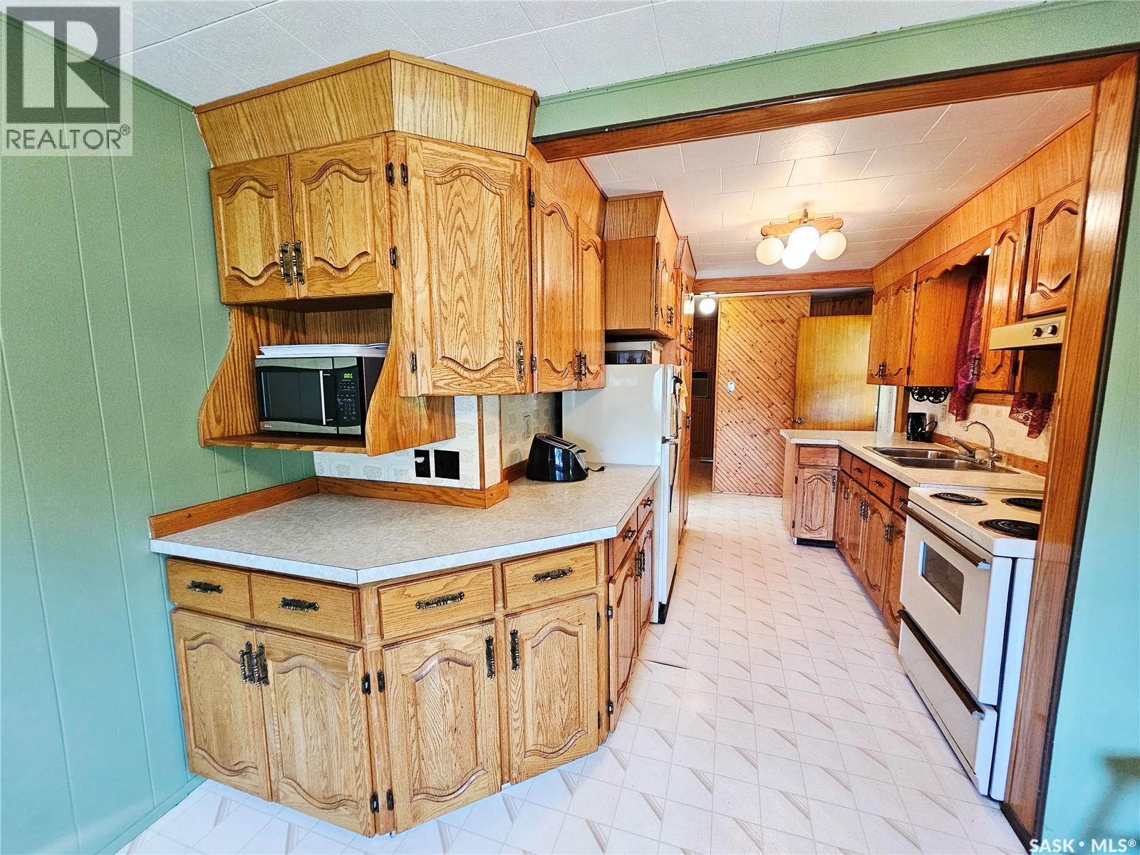 24 Joseph Street, Dubuc, SK - Indoor Photo Showing Kitchen With Double Sink