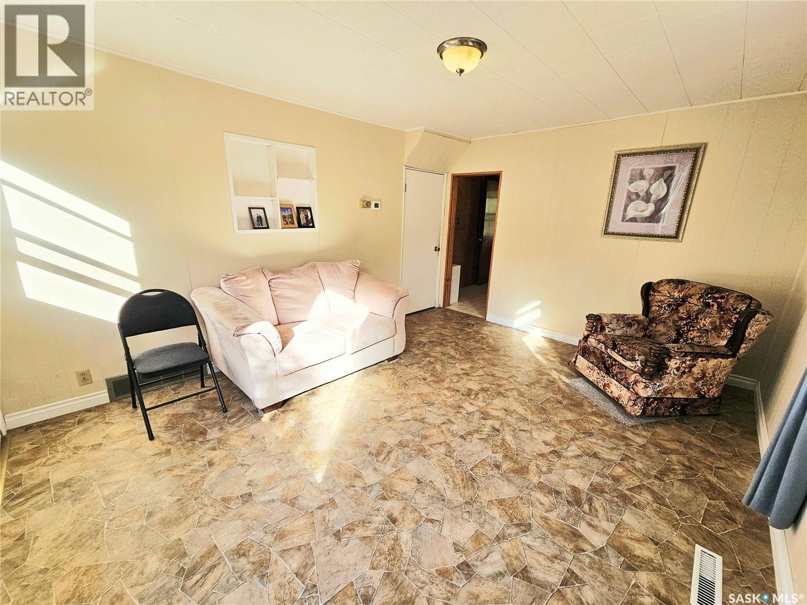 24 Joseph Street, Dubuc, SK - Indoor Photo Showing Living Room