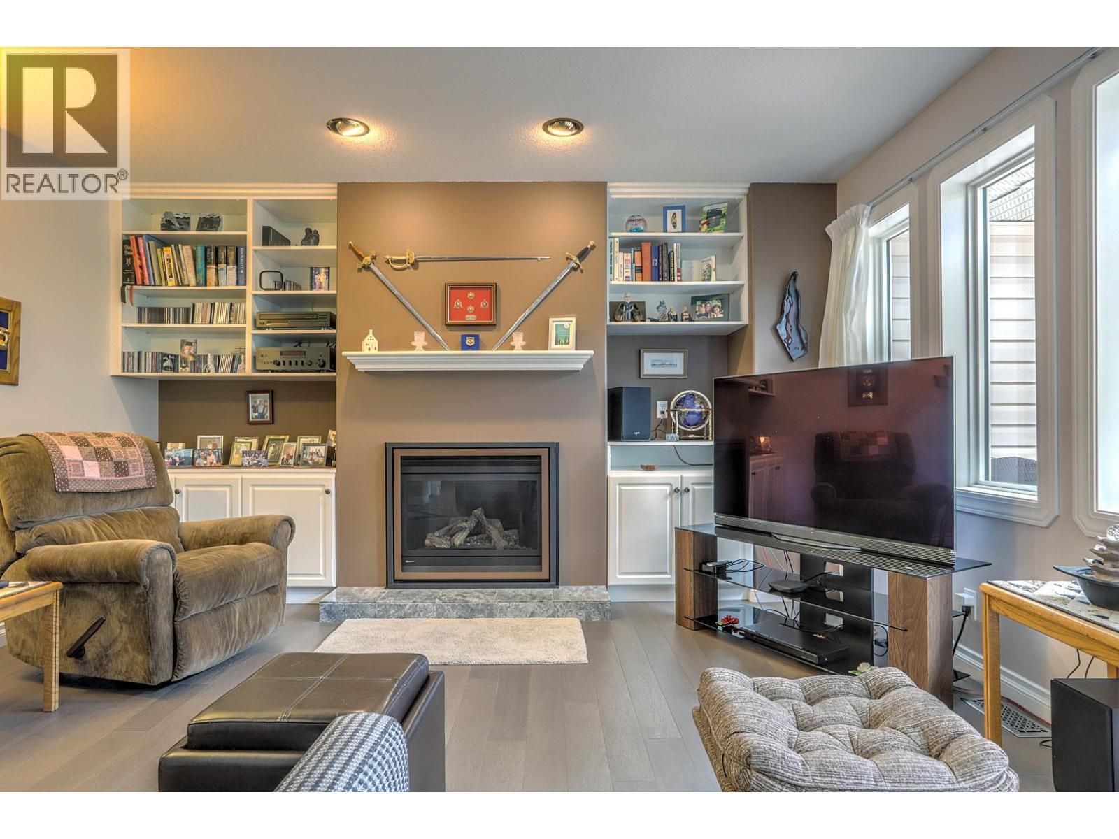 8905 Orchard Ridge Drive, Coldstream, BC - Indoor Photo Showing Living Room With Fireplace