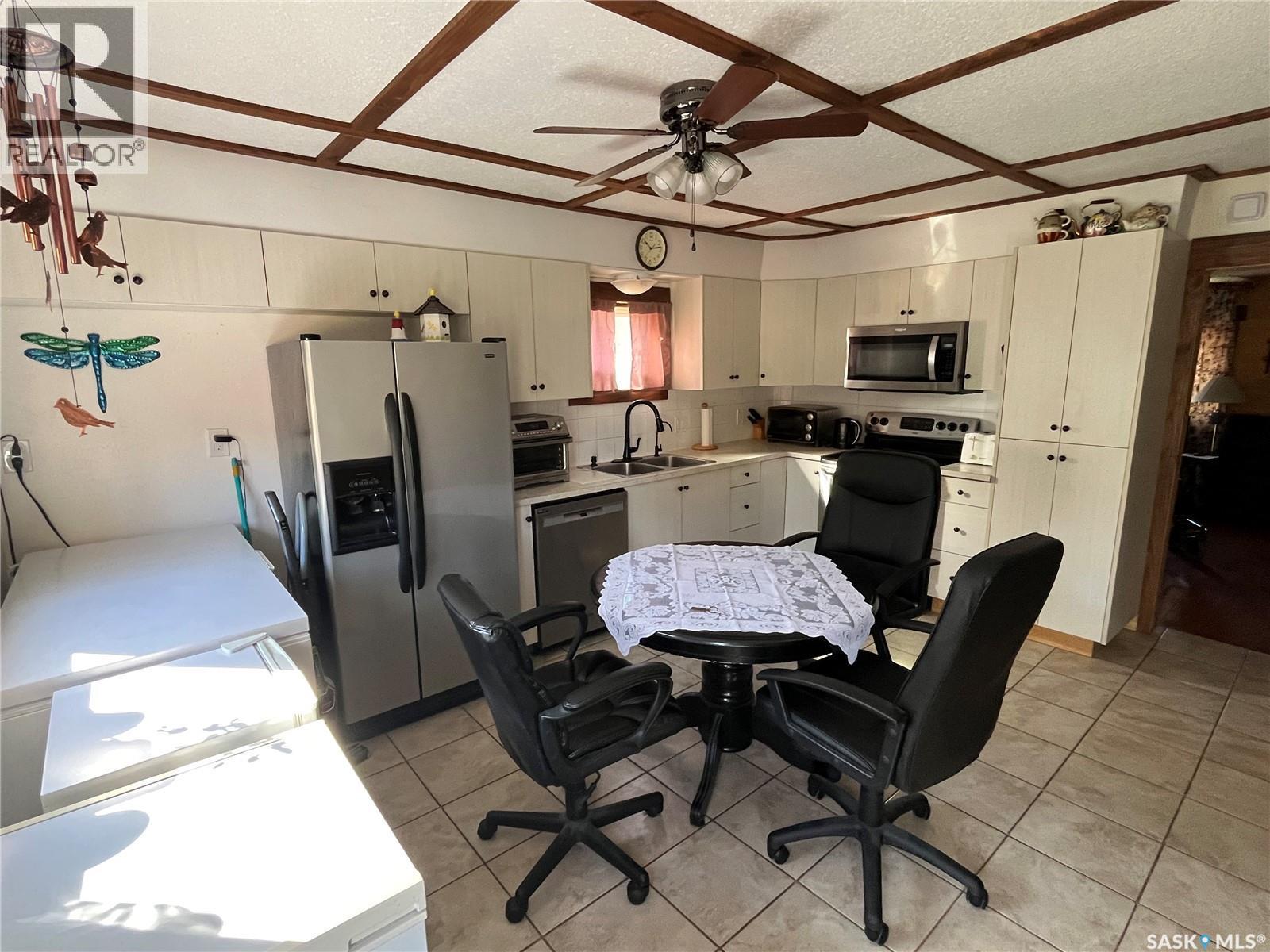 217 Broadway Street, Foam Lake, SK - Indoor Photo Showing Kitchen With Double Sink