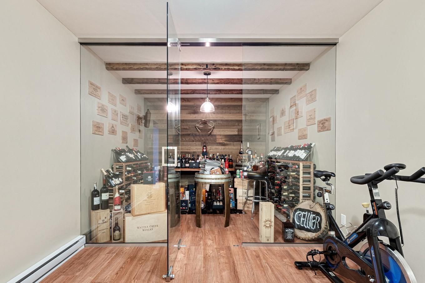 Cave à vin - 314 Rue De Gascogne, Boucherville, QC - Indoor Photo Showing Gym Room