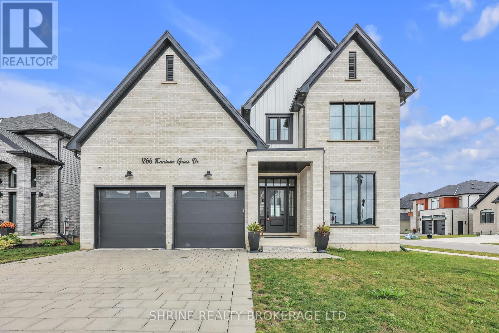 1866 Fountain Grass Drive, London South (South B), ON - Outdoor With Facade