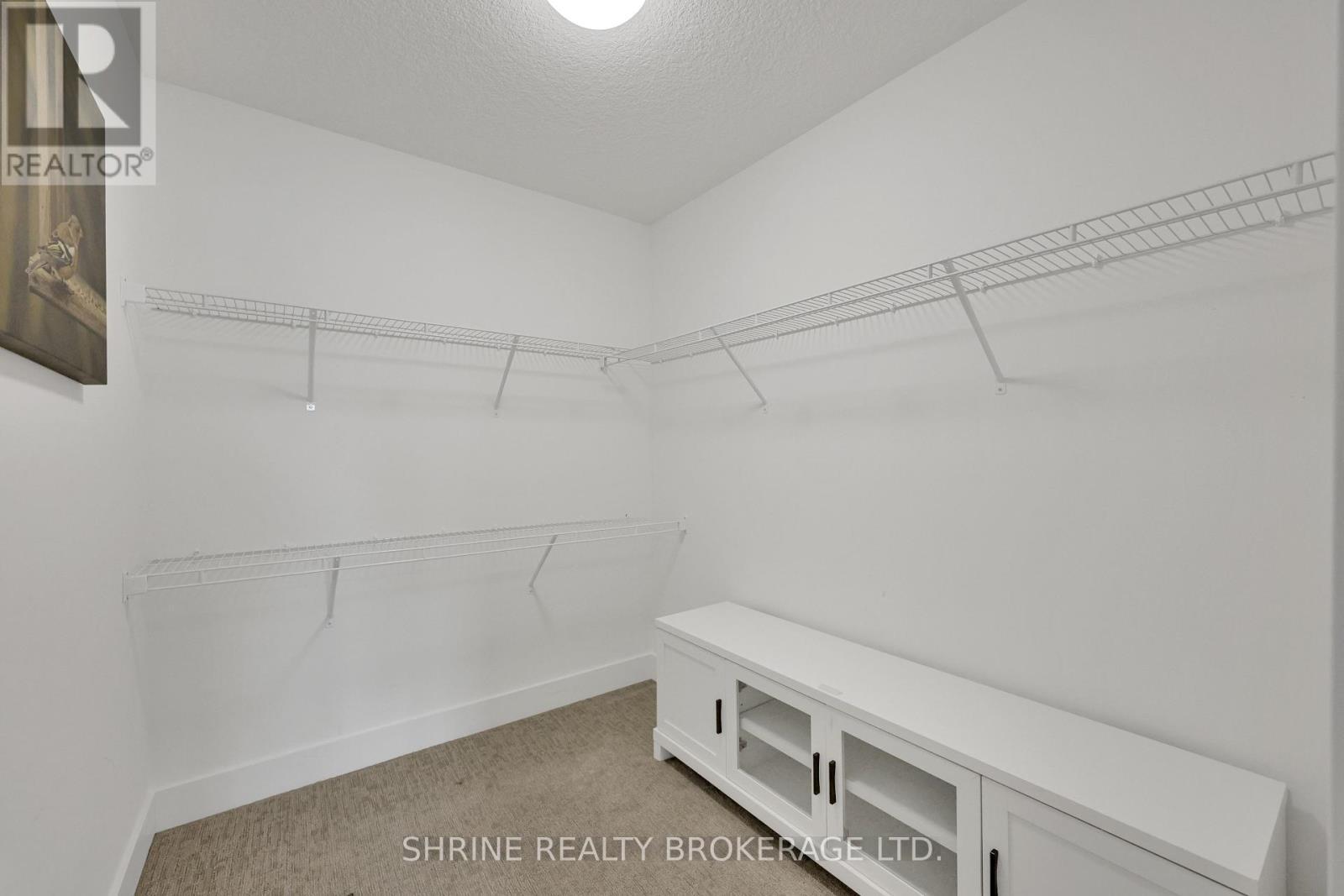 1866 Fountain Grass Drive, London South (South B), ON - Indoor With Storage