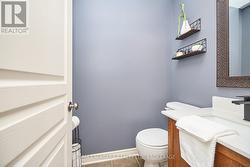 Powder Room - Main Floor -
