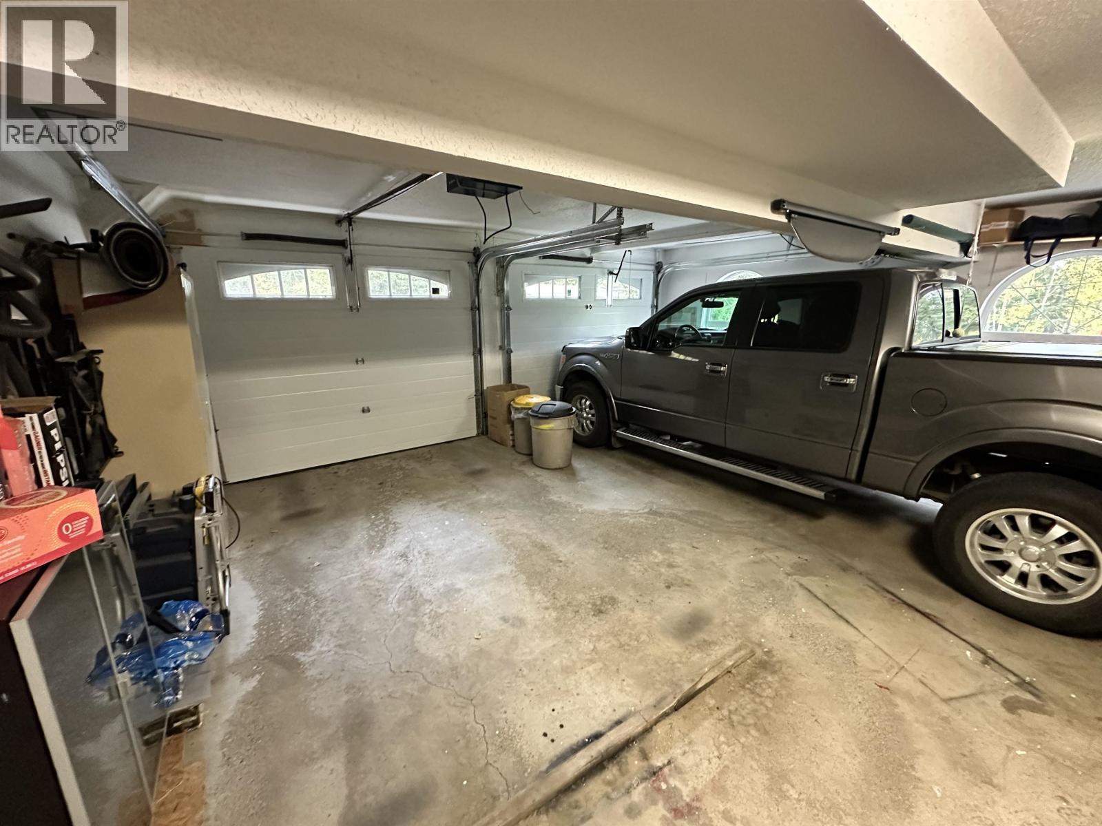 5236 Kallum Drive, 108 Mile Ranch, BC - Indoor Photo Showing Garage