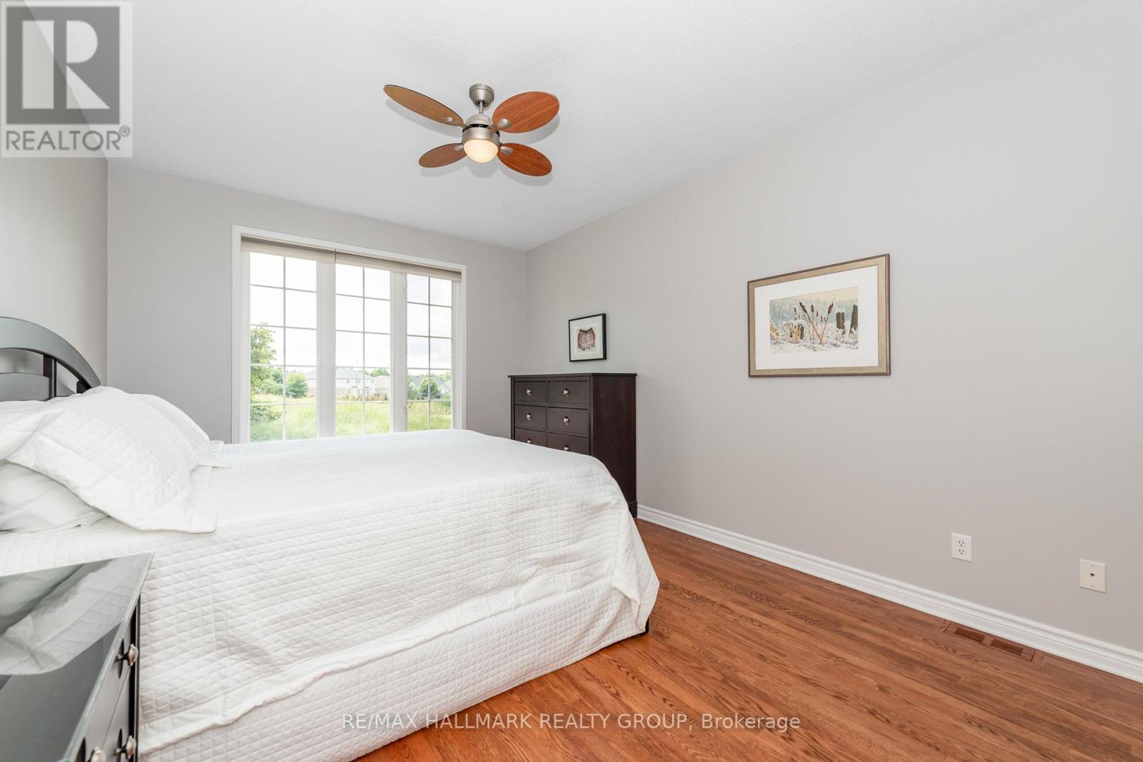 Primary bedroom overlooking the back yard - 102 Kelso Private, Ottawa, ON - Indoor Photo Showing Bedroom