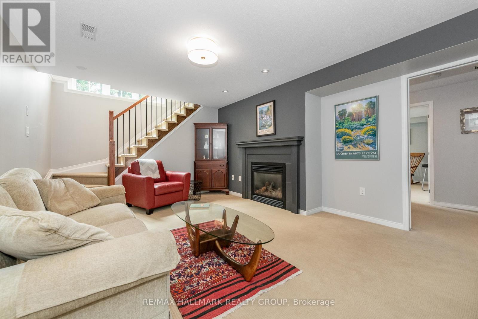 Lots of natural light - 102 Kelso Private, Ottawa, ON - Indoor Photo Showing Living Room With Fireplace