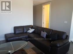 303 - 150 Main Street W, Hamilton, ON - Indoor Photo Showing Living Room