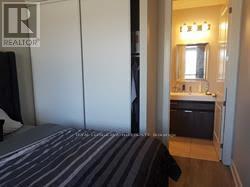 303 - 150 Main Street W, Hamilton, ON - Indoor Photo Showing Bedroom