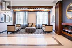 303 - 150 Main Street W, Hamilton, ON - Indoor With Fireplace