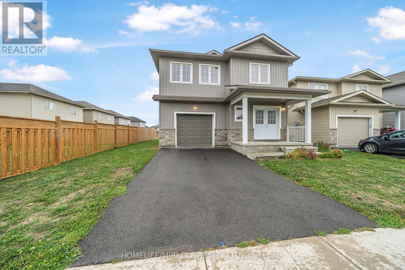 63 Brennan Crescent, Loyalist, ON - Outdoor With Facade
