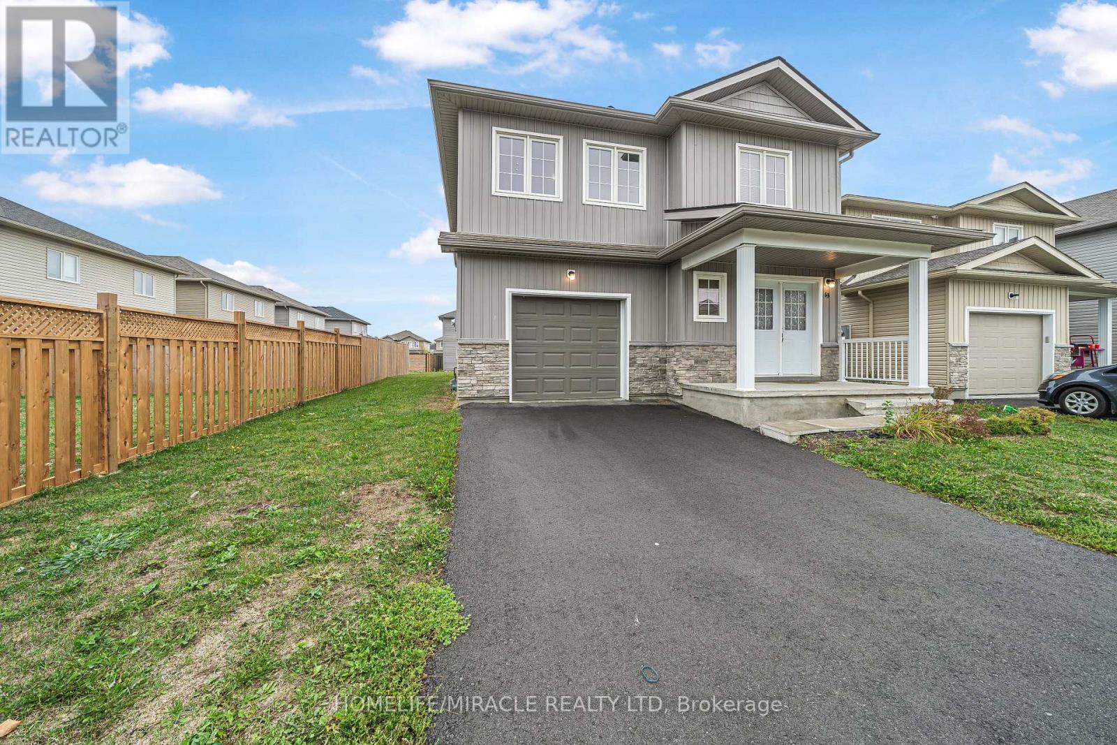 63 Brennan Crescent, Loyalist, ON - Outdoor With Facade