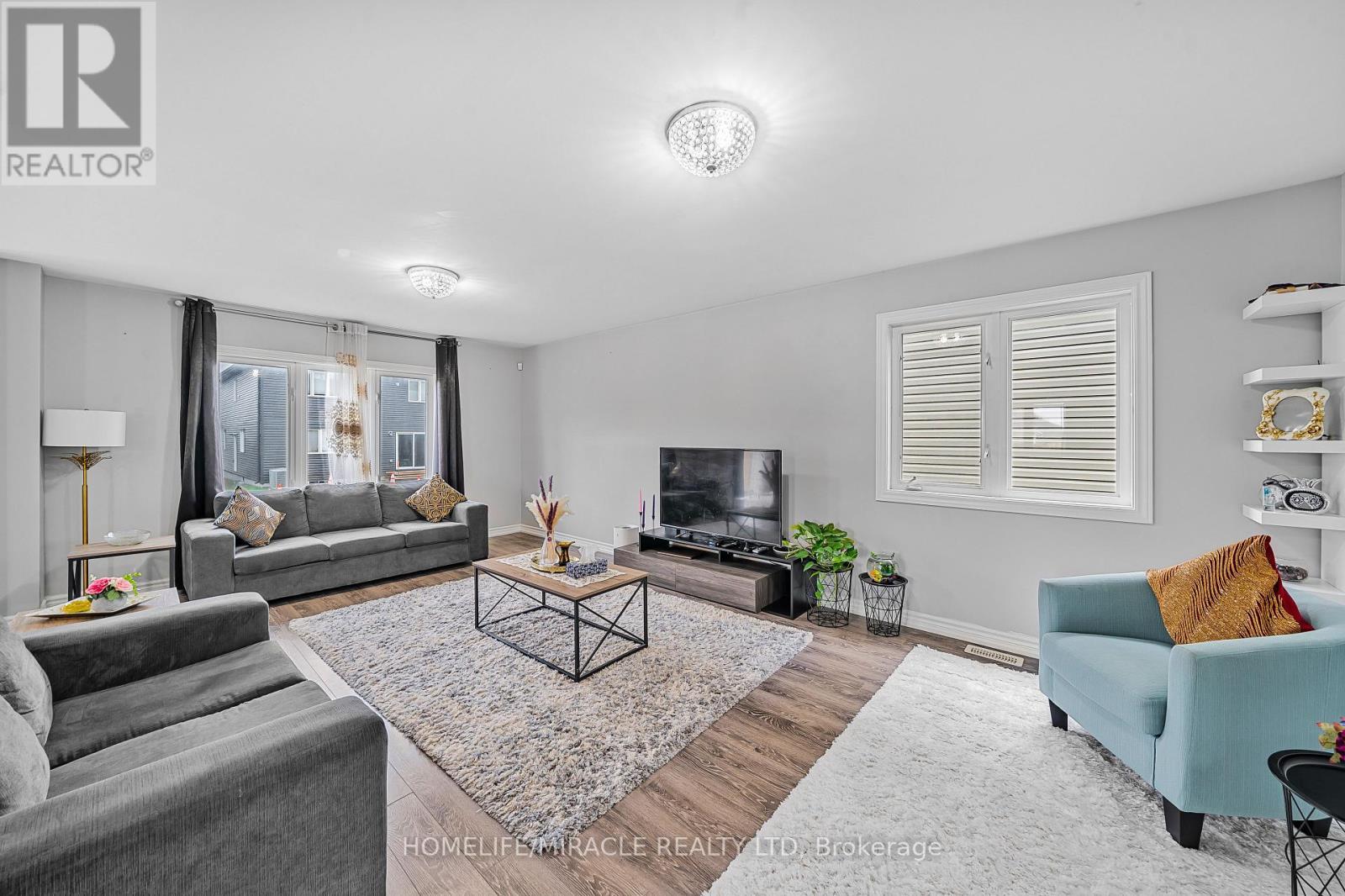 63 Brennan Crescent, Loyalist, ON - Indoor Photo Showing Living Room