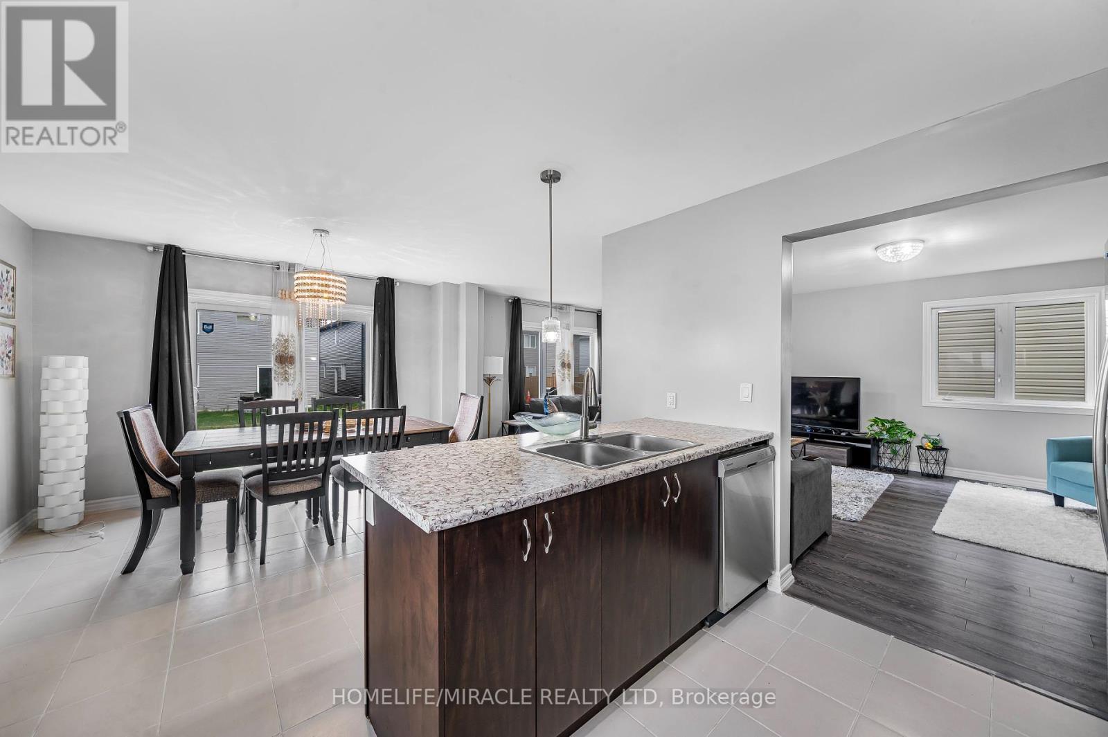 63 Brennan Crescent, Loyalist, ON - Indoor Photo Showing Kitchen With Double Sink
