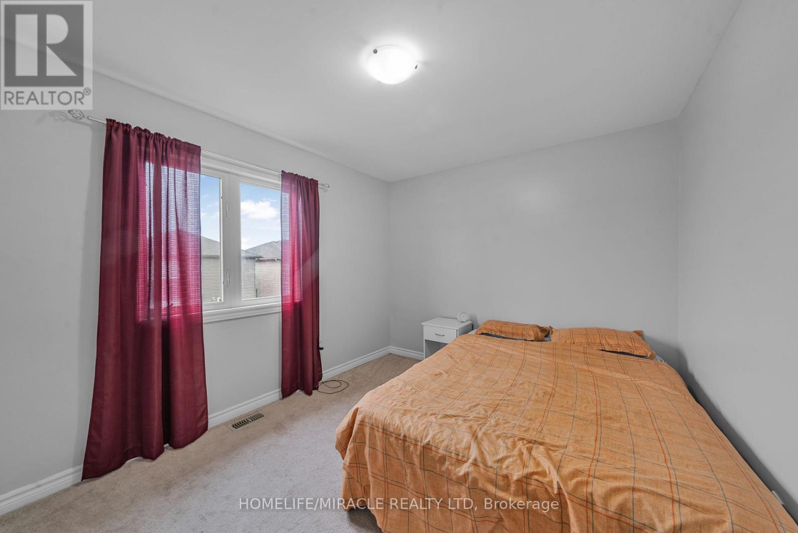 63 Brennan Crescent, Loyalist, ON - Indoor Photo Showing Bedroom