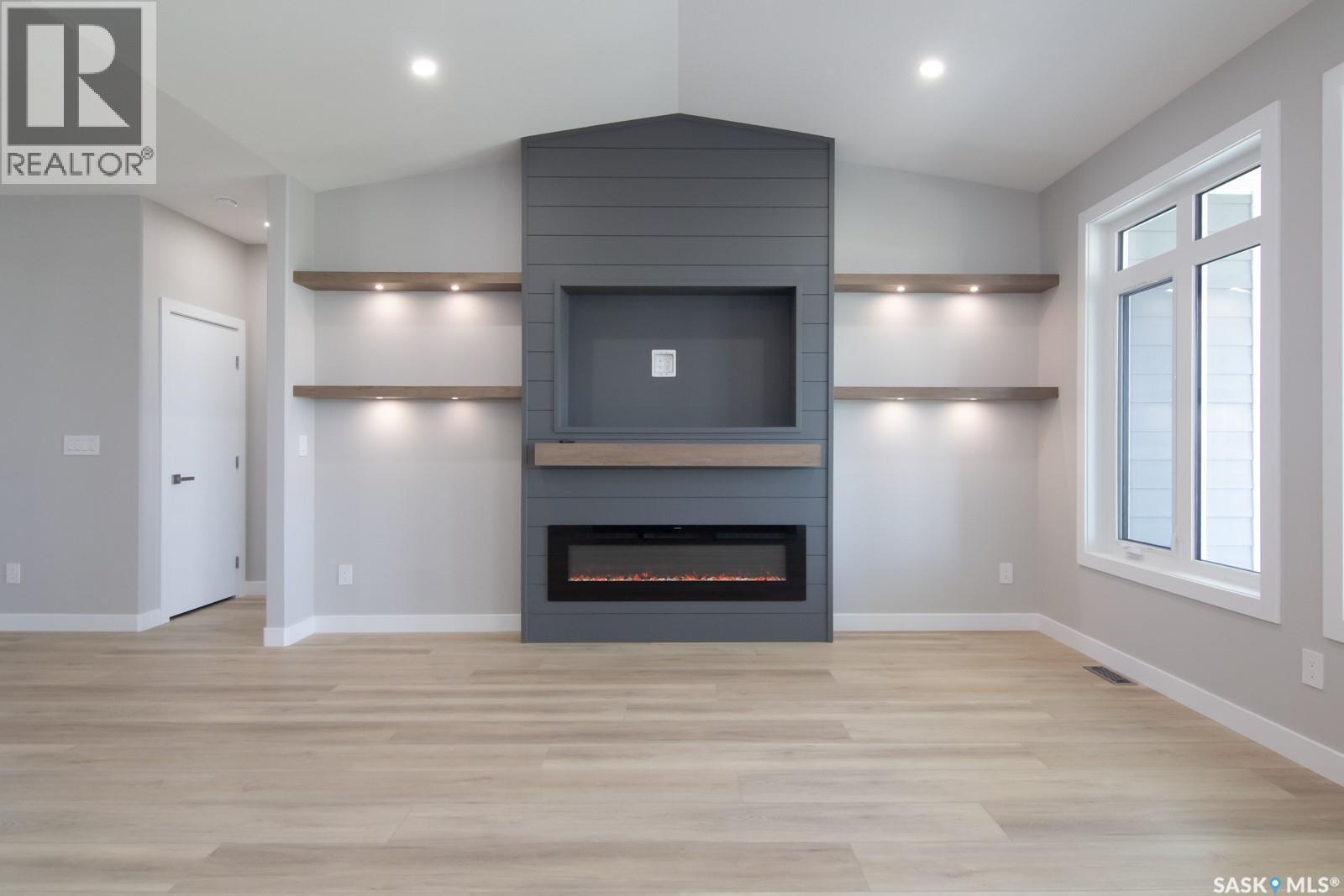 423 Sharma Crescent, Saskatoon, SK - Indoor With Fireplace