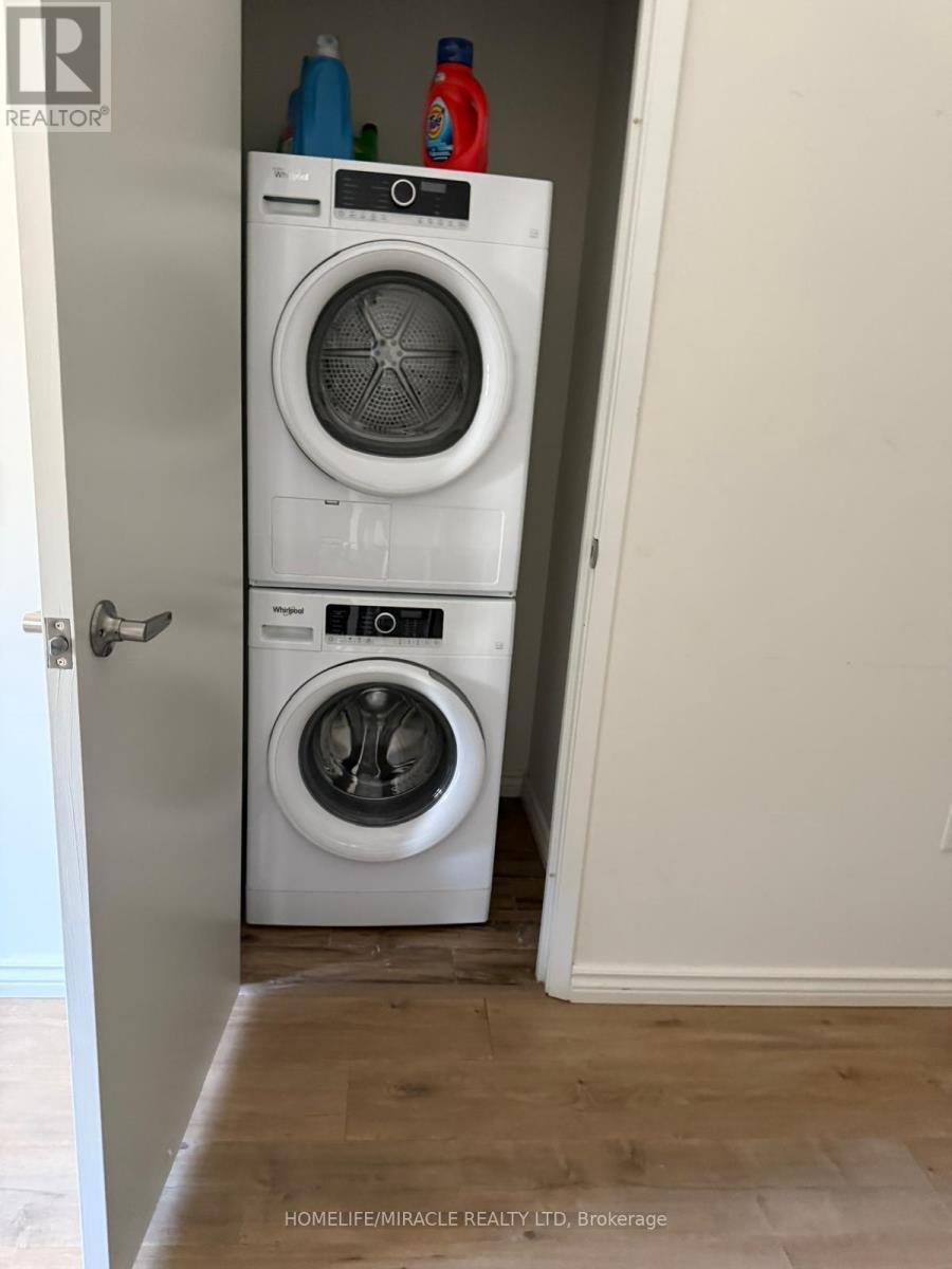 B - 112 - 275 Larch Street, Waterloo, ON - Indoor Photo Showing Laundry Room