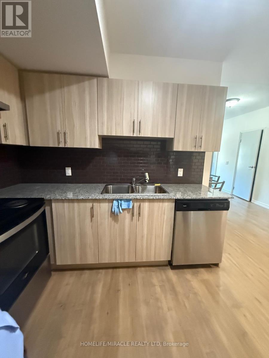 B - 112 - 275 Larch Street, Waterloo, ON - Indoor Photo Showing Kitchen With Double Sink