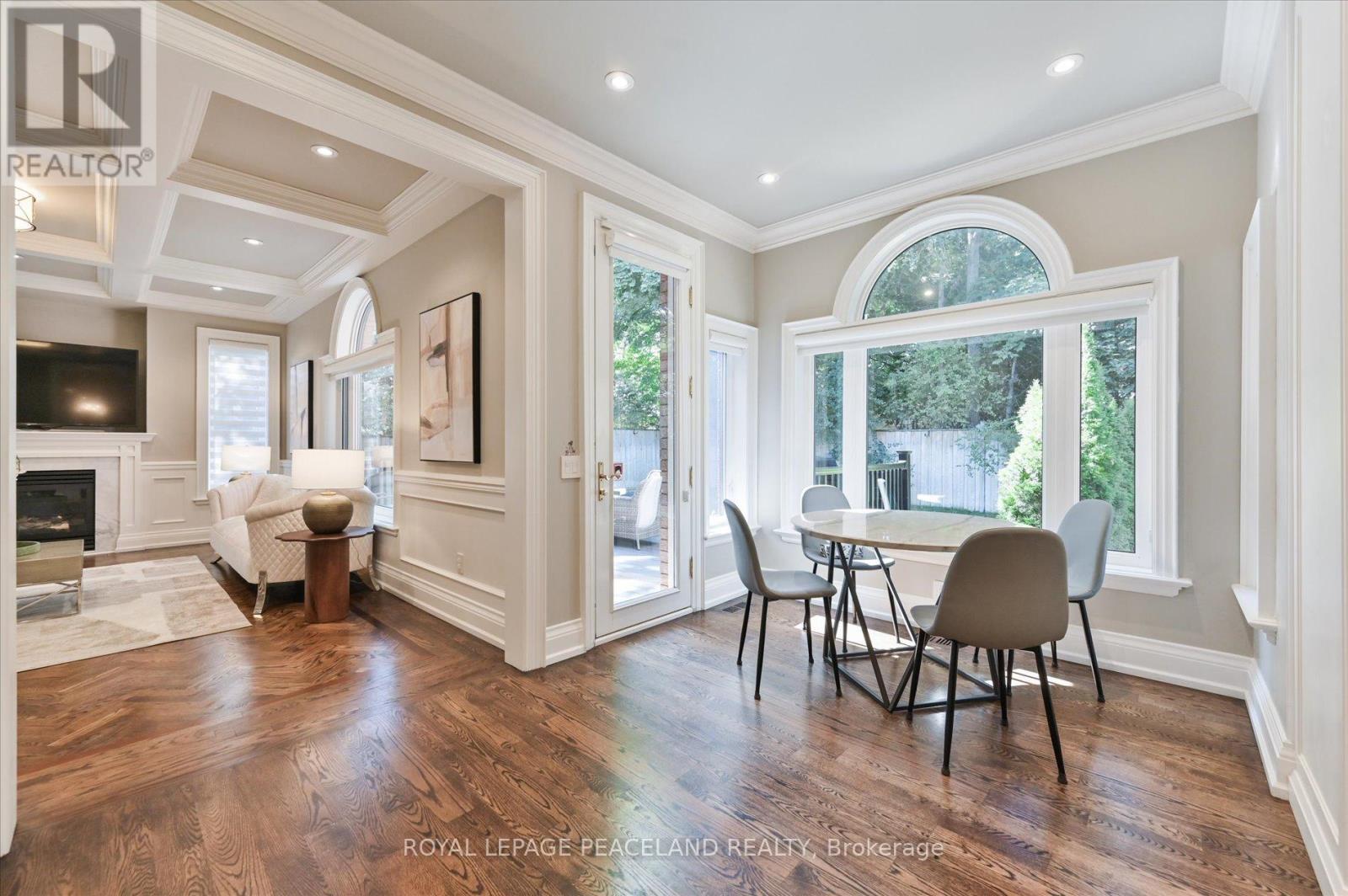 2 Flaremore Crescent, Toronto, ON - Indoor Photo Showing Dining Room With Fireplace