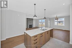 Island with pull put recycling station -