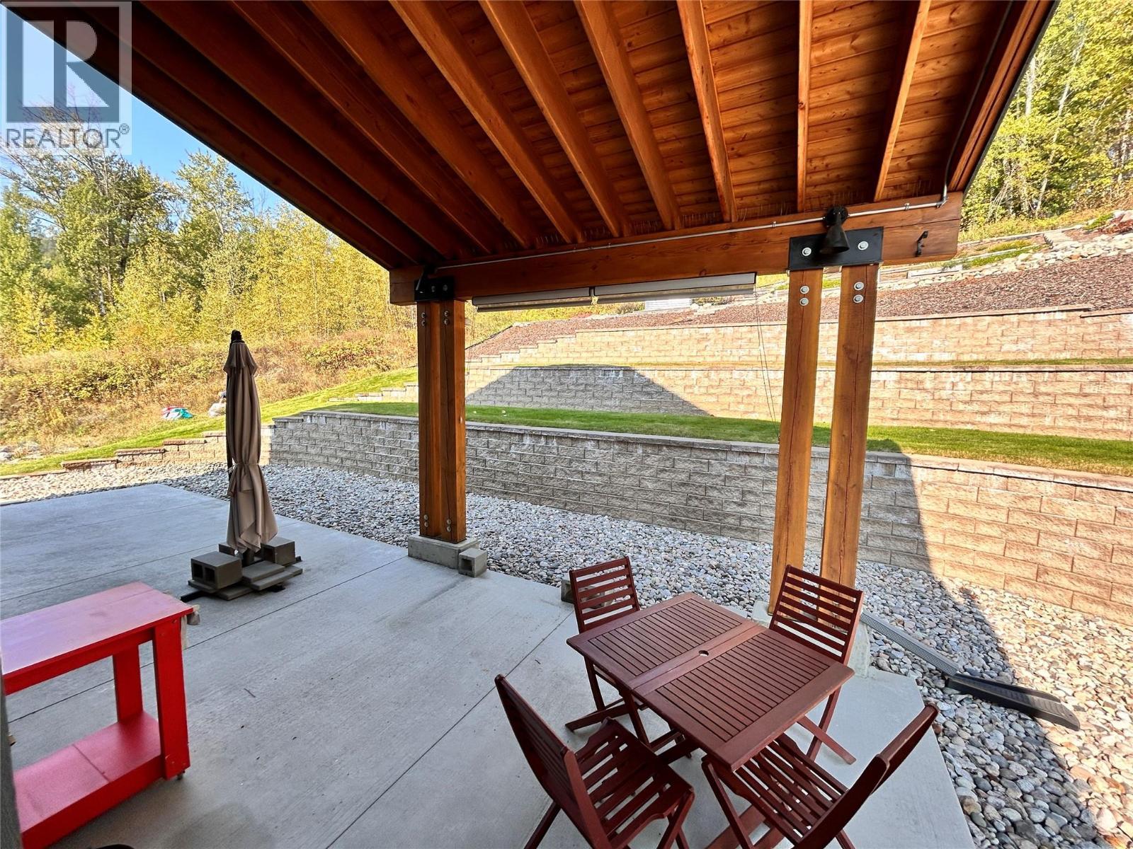 back patio - 1006 Silvertip Road, Rossland, BC - Outdoor With Exterior
