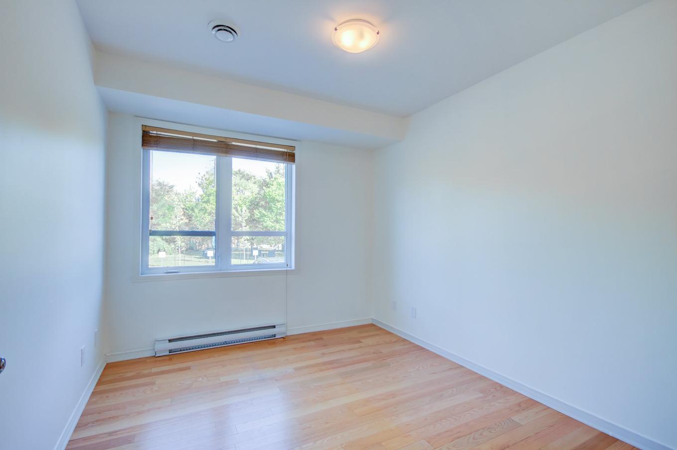 Chambre à coucher - 1-34 Av. Ste-Hélène, Saint-Lambert, QC - Indoor Photo Showing Other Room