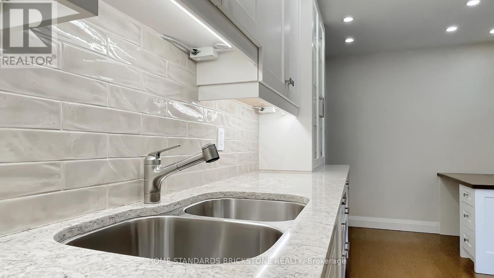 803 - 47 St Clair Avenue W, Toronto, ON - Indoor Photo Showing Kitchen With Double Sink