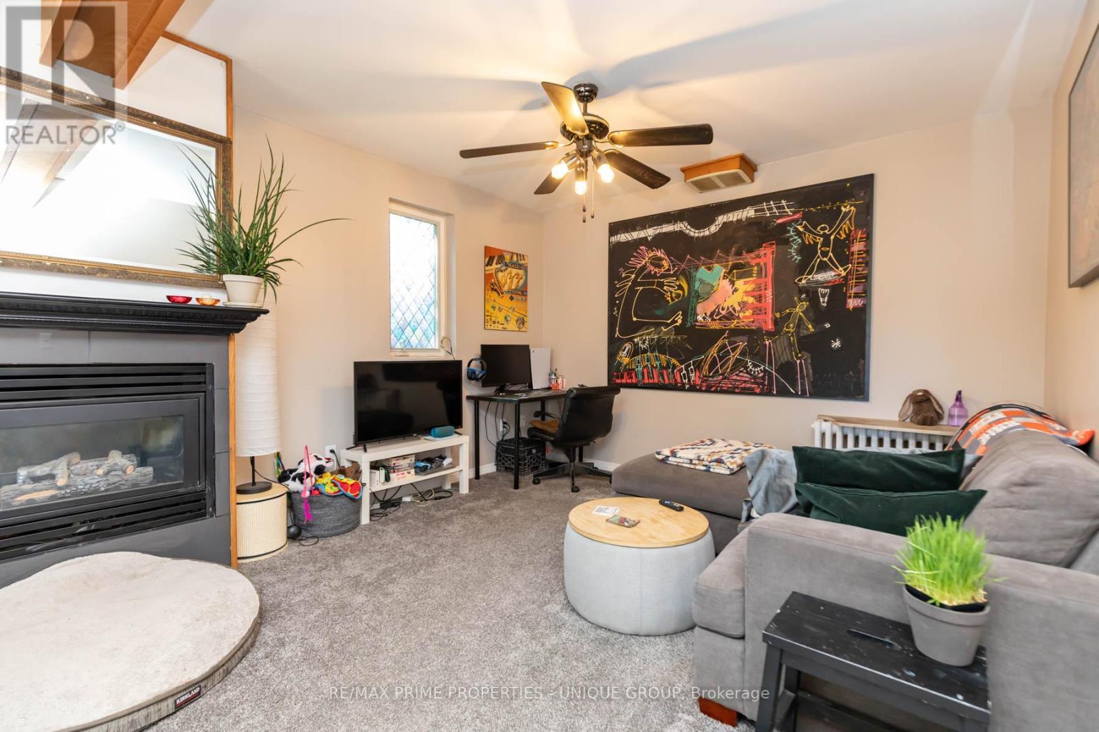 40 Jeavons Avenue, Toronto, ON - Indoor Photo Showing Living Room With Fireplace