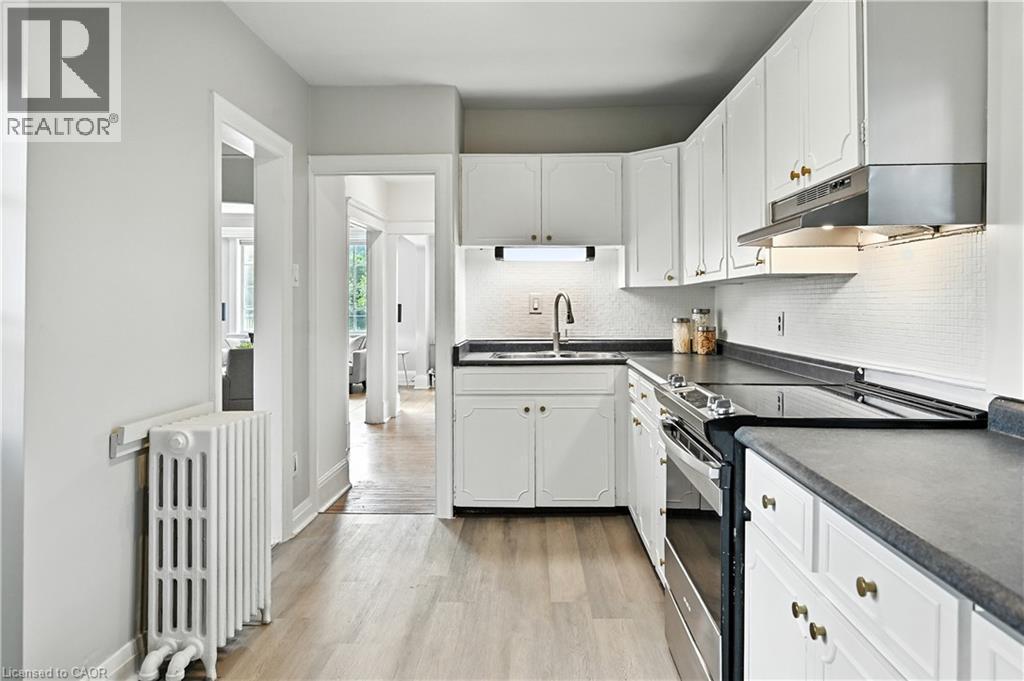1047 Main Street E, Hamilton, ON - Indoor Photo Showing Kitchen With Double Sink