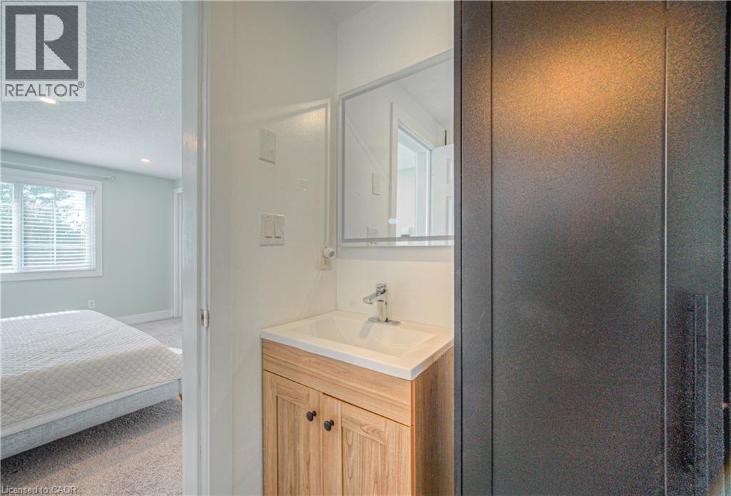 Bathroom with vanity, a textured ceiling, ensuite bath, and recessed lighting - 220 Sienna Crescent, Kitchener, ON - Indoor Photo Showing Bathroom