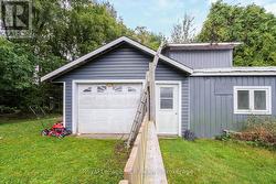 garage with attached shop -