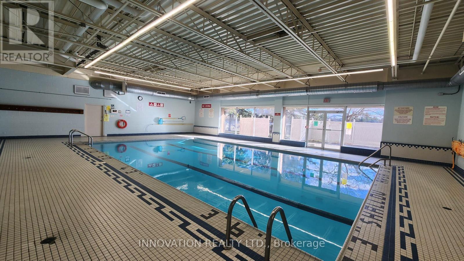 1406 - 2020 Jasmine Crescent, Ottawa, ON - Indoor Photo Showing Other Room With In Ground Pool