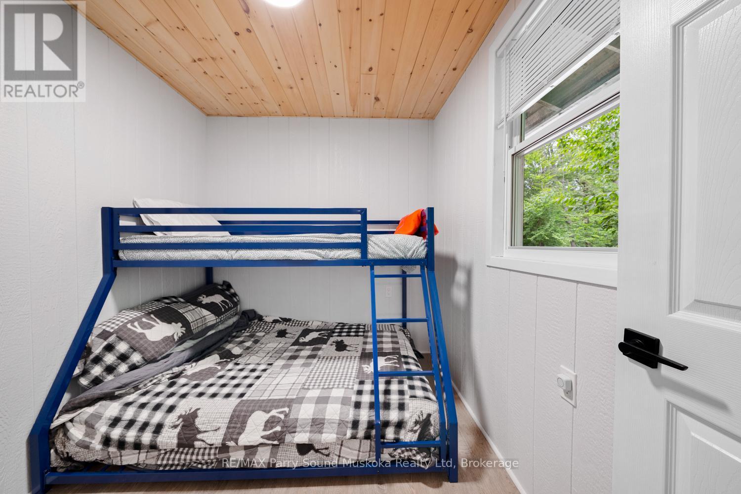 3 Macey Drive, Whitestone, ON - Indoor Photo Showing Bedroom
