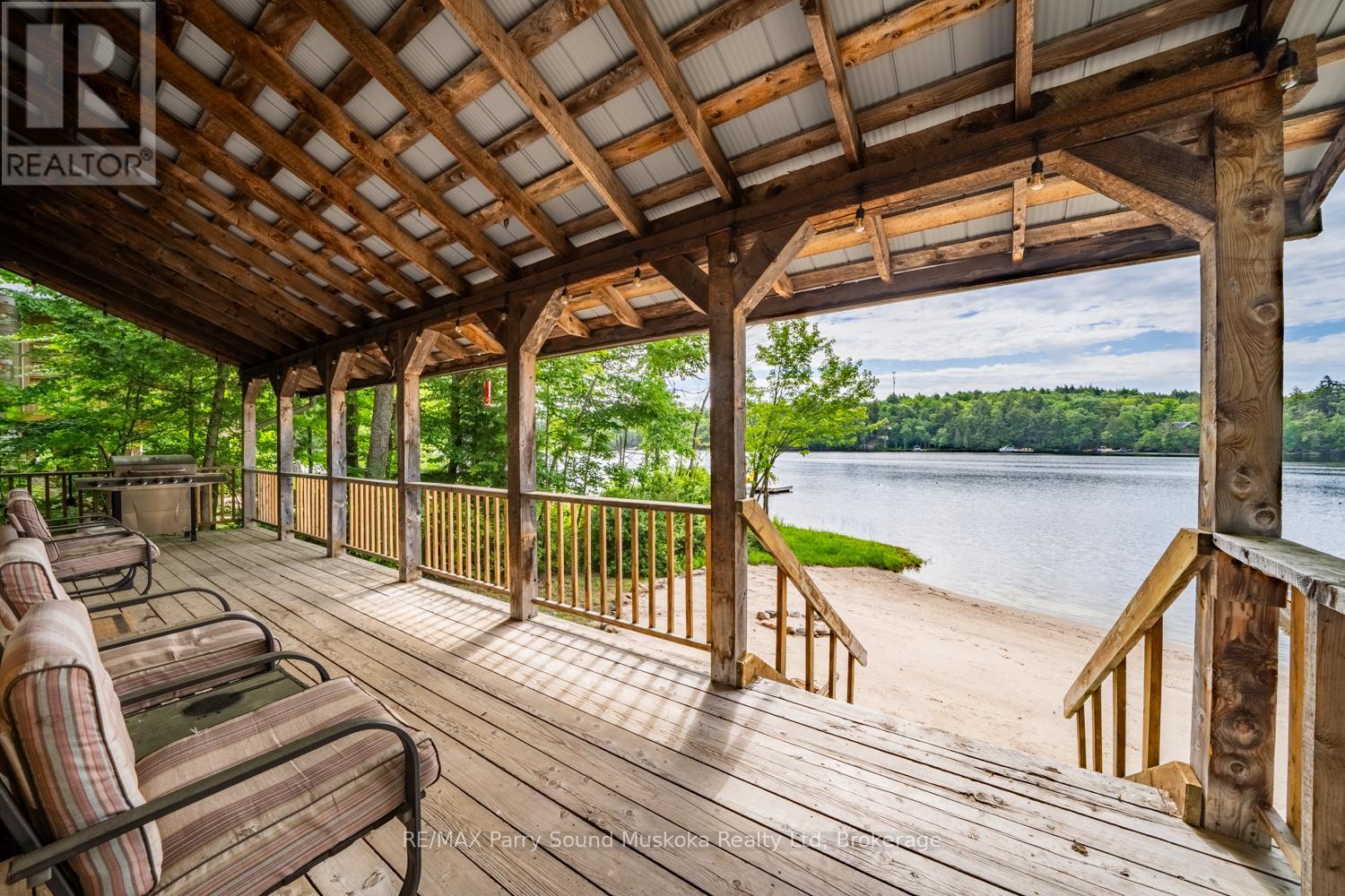3 Macey Drive, Whitestone, ON - Outdoor With Body Of Water With Deck Patio Veranda With Exterior