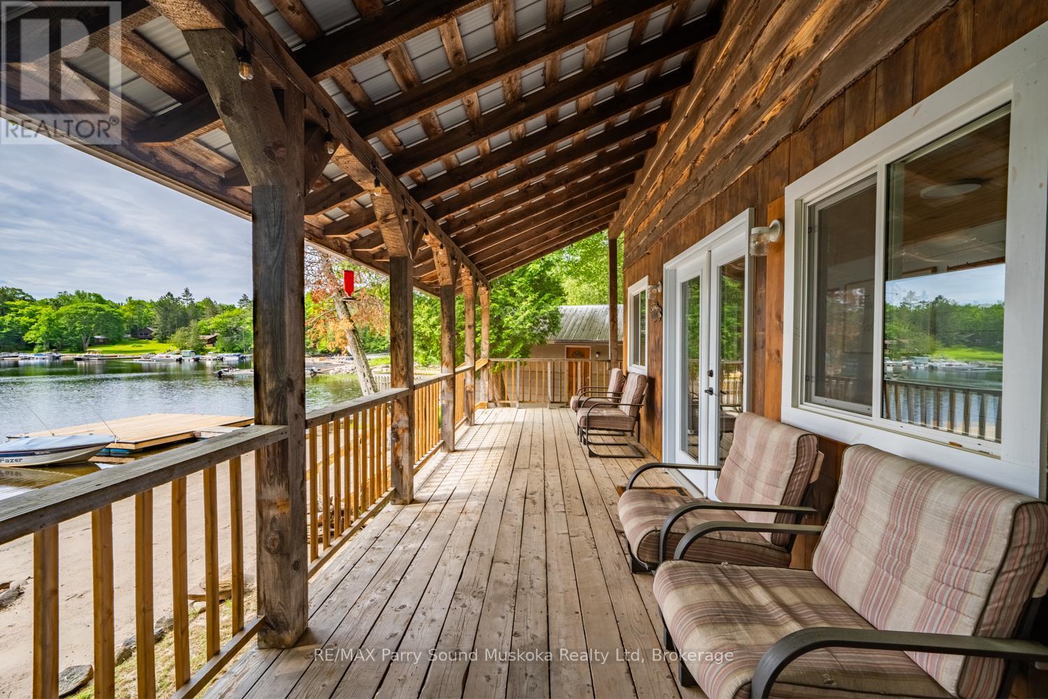 3 Macey Drive, Whitestone, ON - Outdoor With Body Of Water With Deck Patio Veranda With Exterior