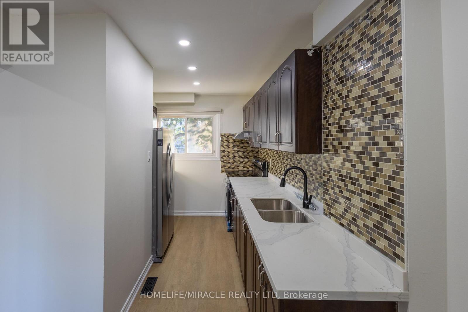8 Grand Valley Drive, Brampton, ON - Indoor Photo Showing Kitchen With Double Sink
