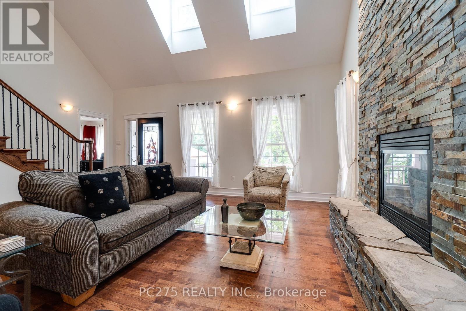 23 Mactavesh Crescent, Bluewater (Bayfield), ON - Indoor Photo Showing Living Room With Fireplace