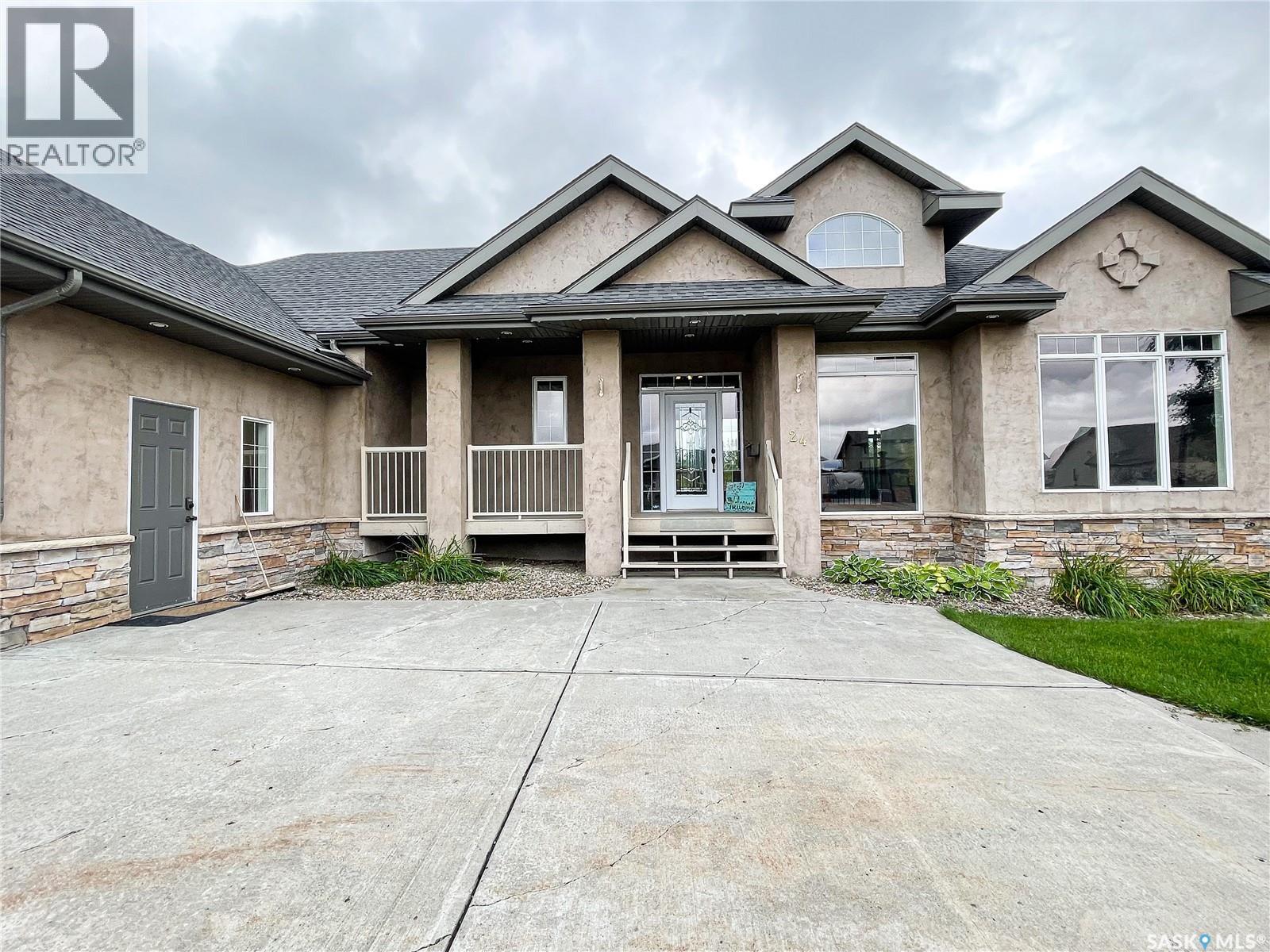 24 Bridger Drive, Meadow Lake, SK - Outdoor With Deck Patio Veranda With Facade
