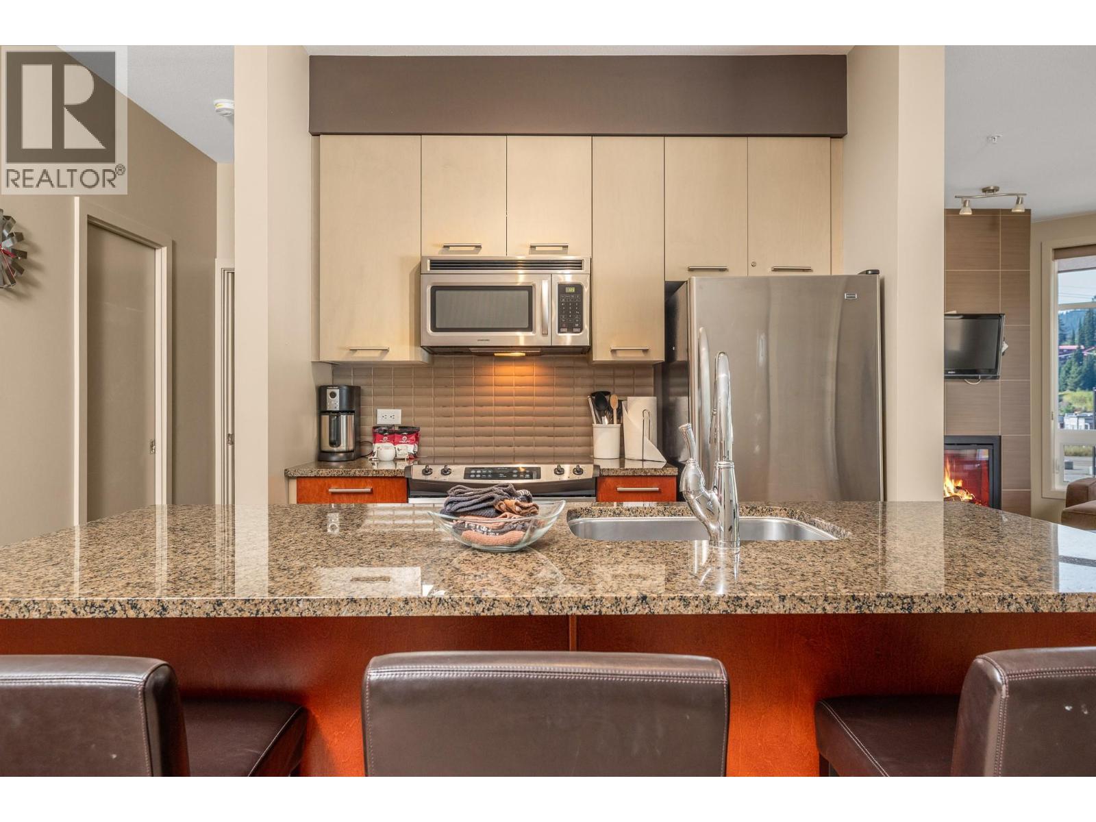 30 Monashee Road Unit# 214, Silver Star, BC - Indoor Photo Showing Kitchen With Upgraded Kitchen