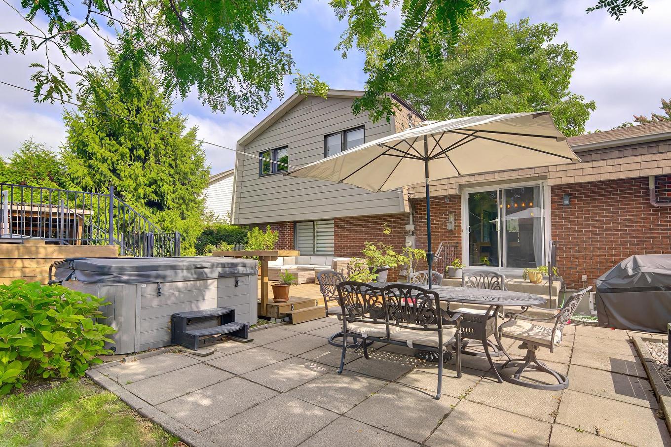 Backyard - 239 Rue Libersan, Sainte-Thérèse, QC - Outdoor With Deck Patio Veranda