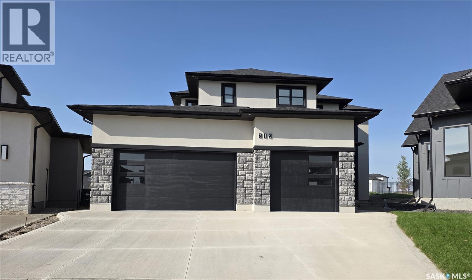 319 Woolf Bay, Saskatoon, SK - Outdoor