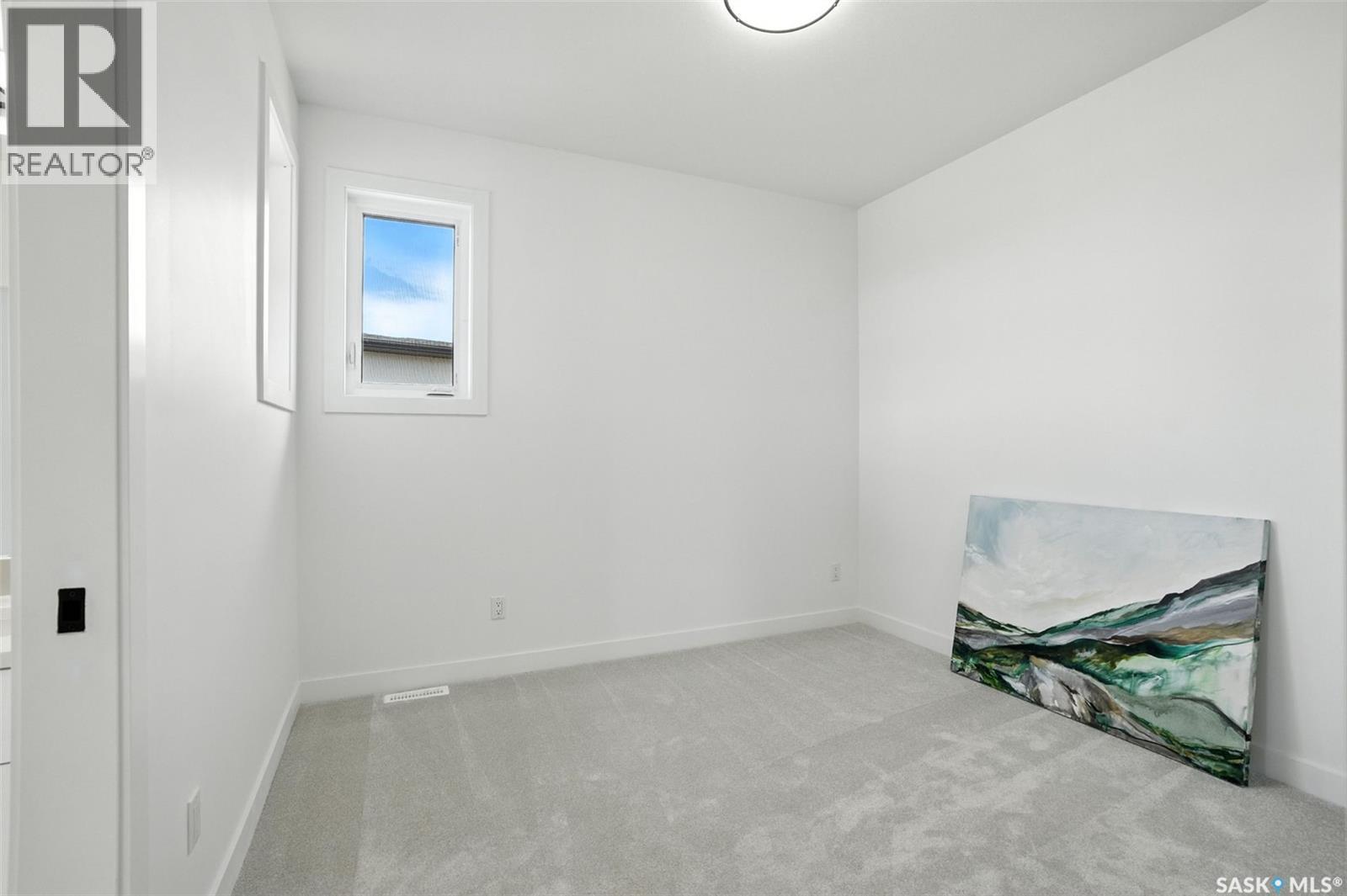 319 Woolf Bay, Saskatoon, SK - Indoor Photo Showing Other Room