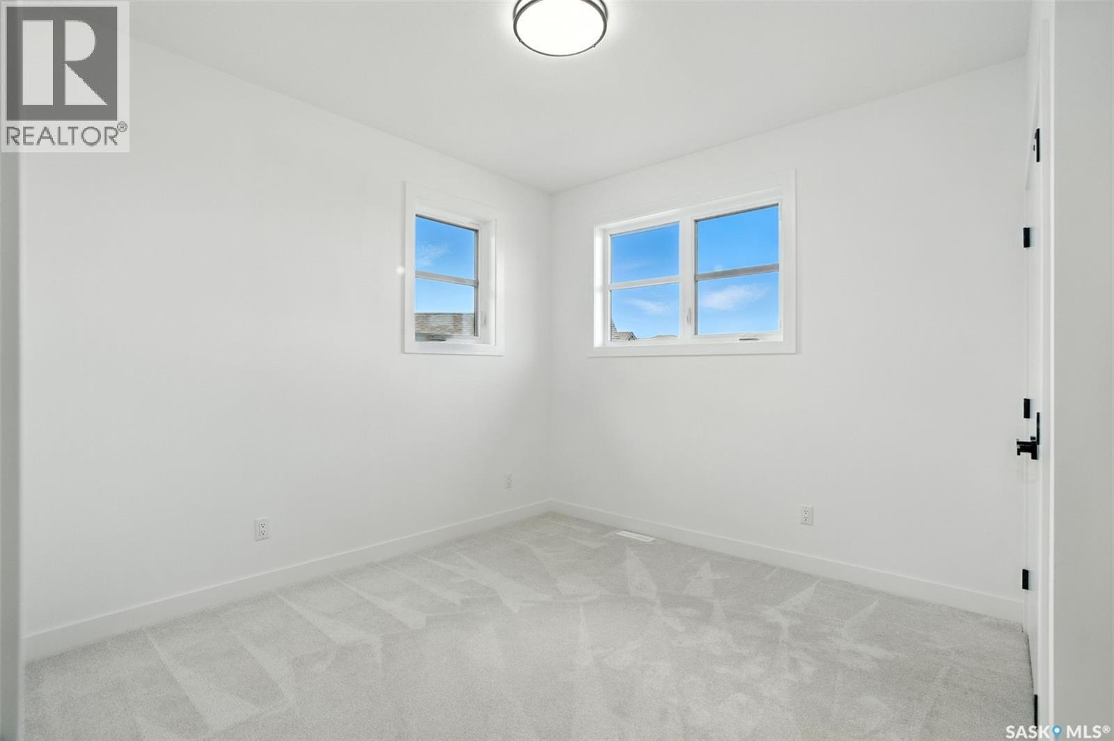 319 Woolf Bay, Saskatoon, SK - Indoor Photo Showing Other Room