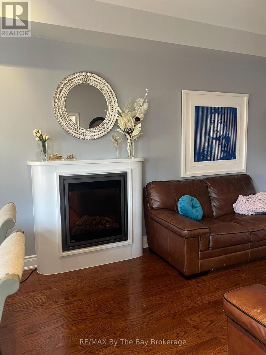 46 Sandy Coast Crescent, Wasaga Beach, ON - Indoor Photo Showing Living Room With Fireplace